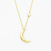 14k Gold necklace with a crescent moon and star pendant on a white background